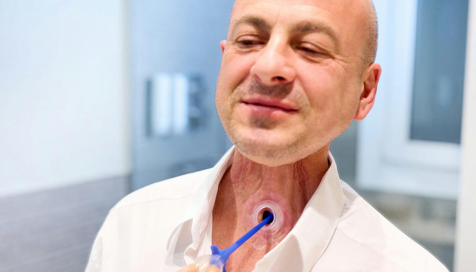 laryngectomy patient cleans stoma